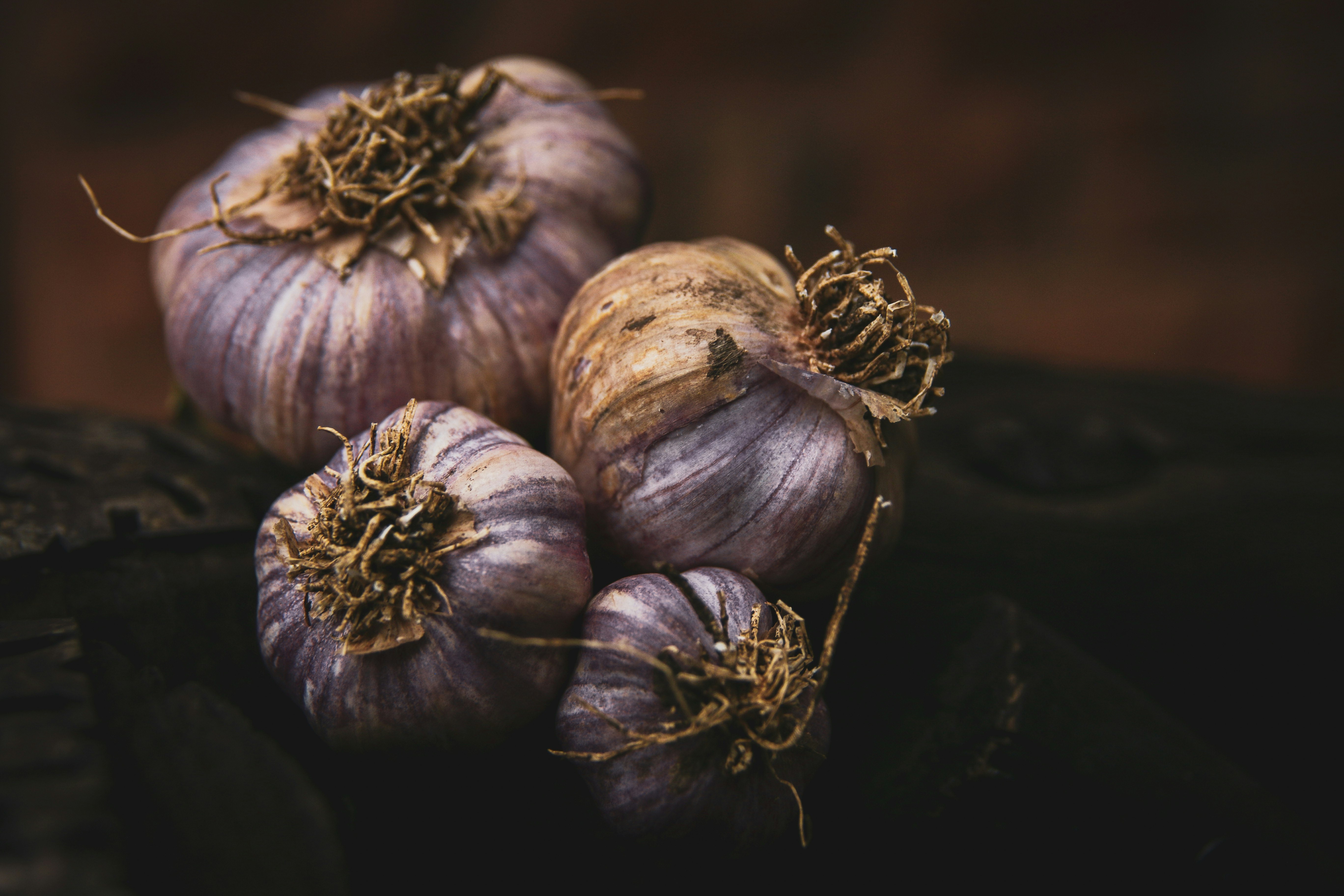 black and white garlic on black textile